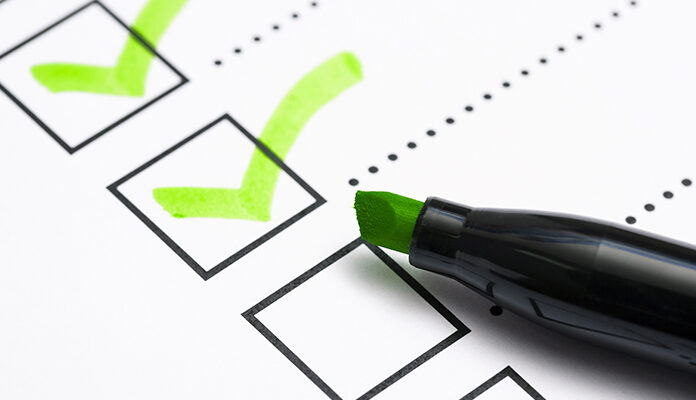 Met marker worden vinkjes in hokjes gezet