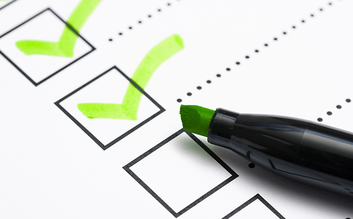 Met marker worden vinkjes in hokjes gezet