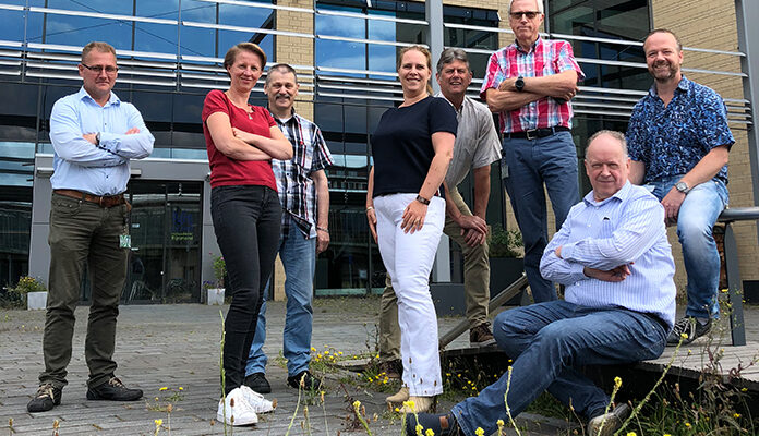 Medewerkers van DCMR op groepsfoto