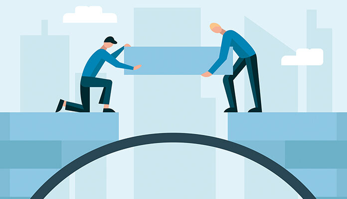 Illustratie met twee mannen die ieder aan de andere kant van een brug staan en samen de laatste steen leggen