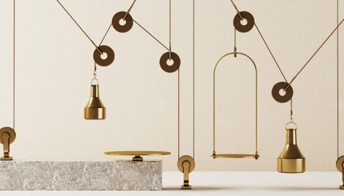 Verschillende weegschalen en gewichten die elkaar in evenwicht houden