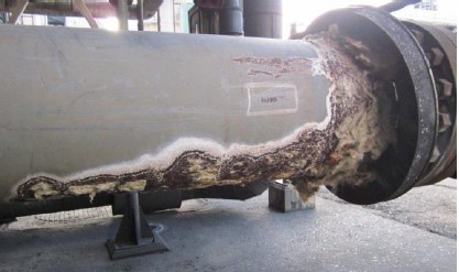 Afbeelding van een verroeste buis waarbij sprake is van ageing