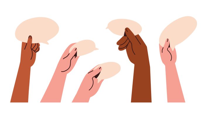 Handen die praatwolkjes omhoog houden